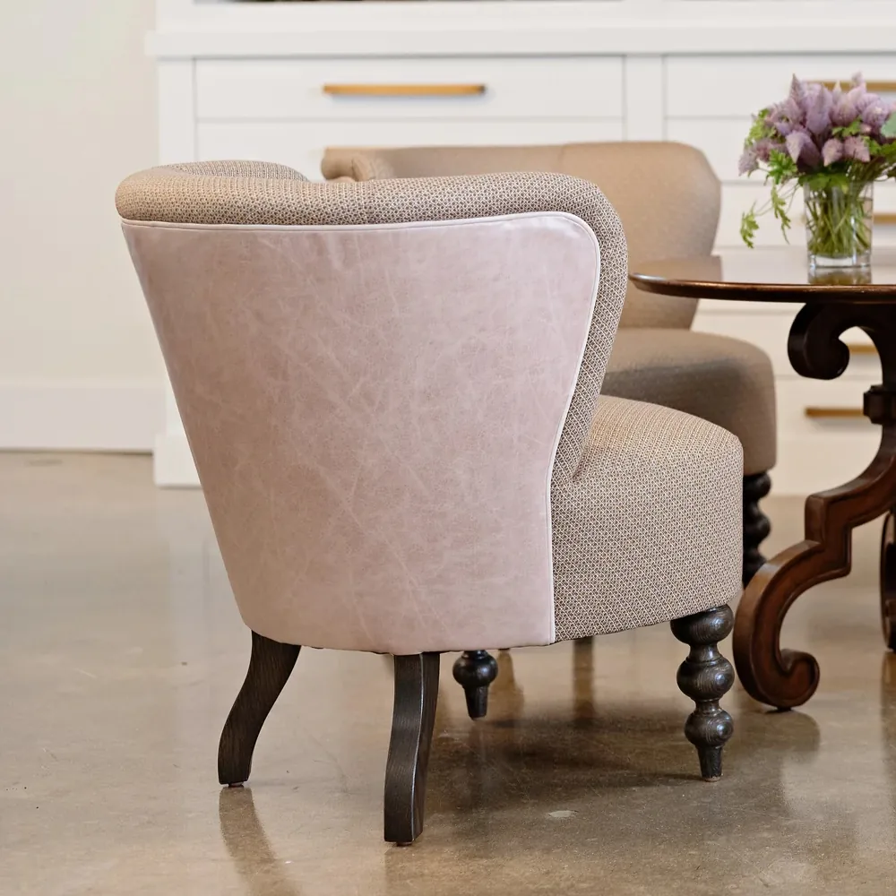 Modern luxury armchair with brown metal frame.