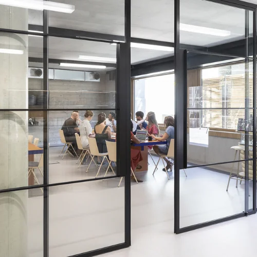Framed glass partition installed in a Dubai space