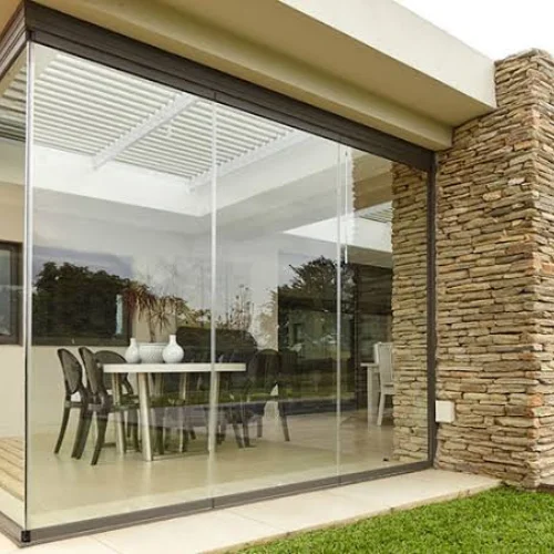 Frameless glass partition installed in a Dubai space