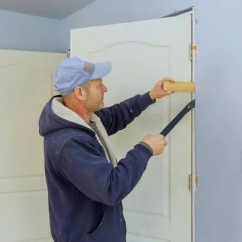 Door repair project displayed in a Dubai gallery
